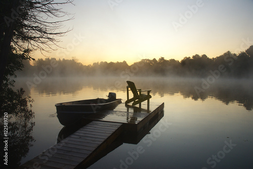 Muskoka Chair and small boat, Ontario