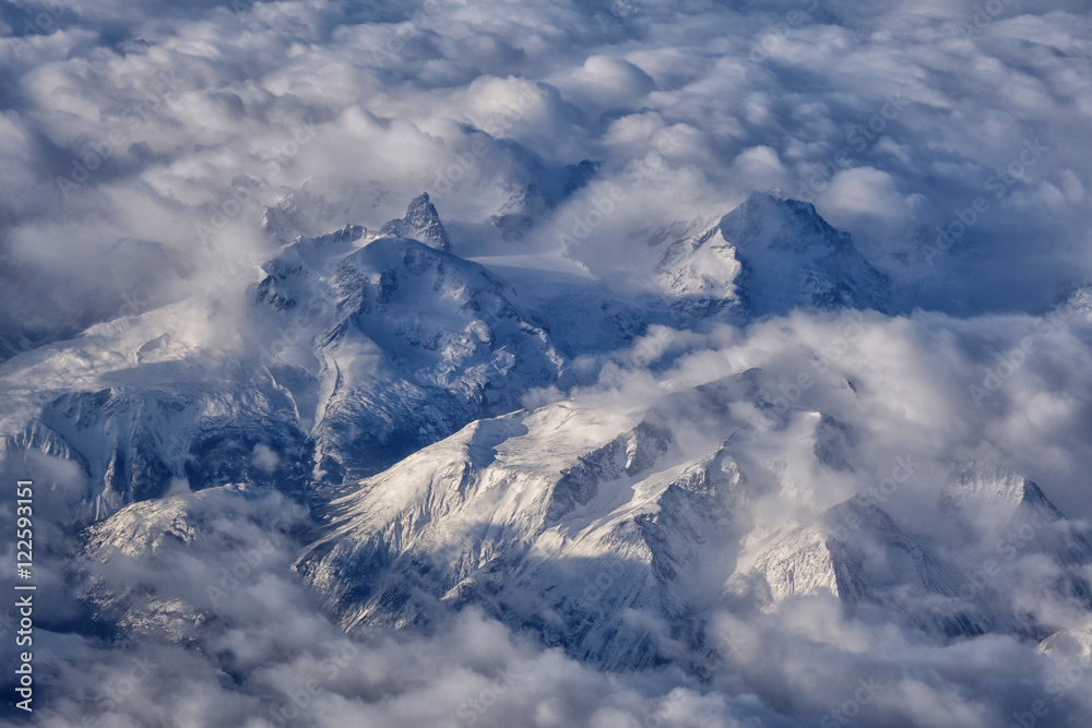 British Columbia's coast mountains seen in an aerial photo along the route between Whitehorse, Yukon and Vancouver, BC. British Columbia's coast mountains seen in an aerial photo along the route between Whitehorse, Yukon and Vancouver, BC.