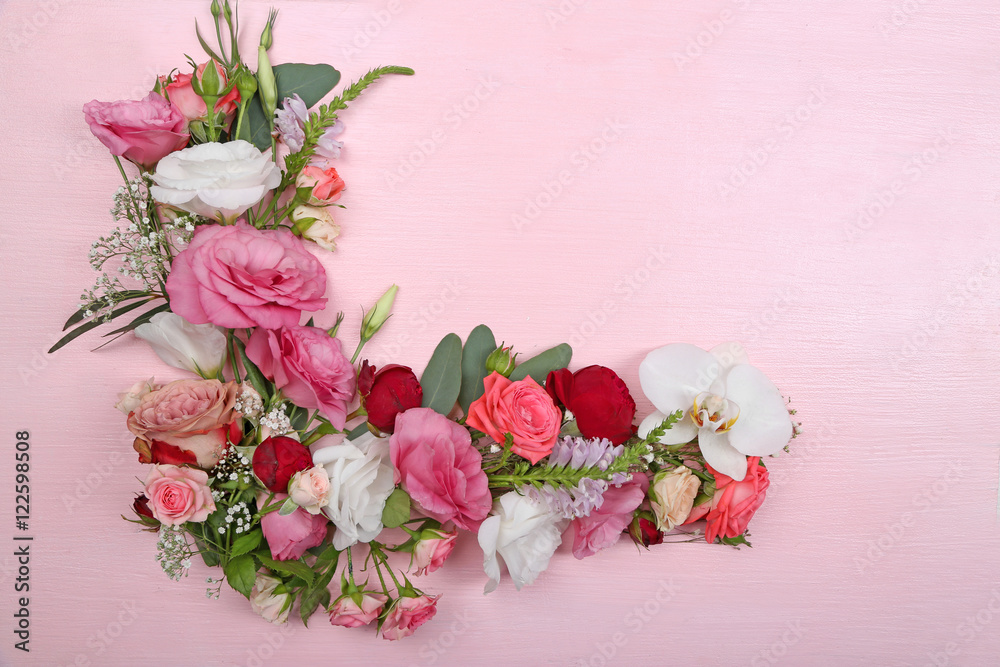 Fresh flowers on  wooden background