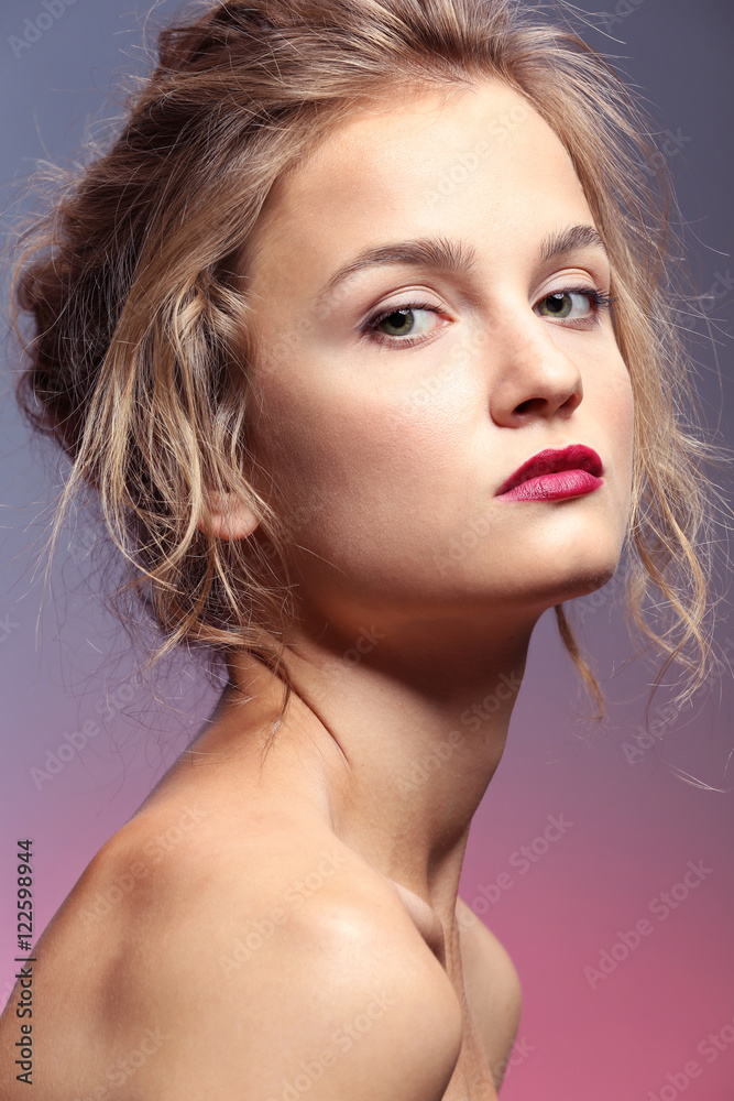Naklejka premium Closeup portrait of beautiful young woman
