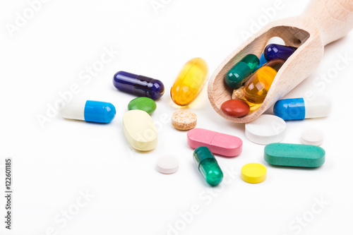 Color pills with wooden dispencer