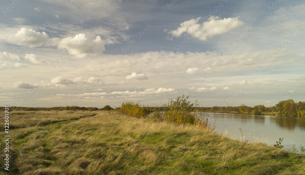 Autumn landscape with river on background sky Autumn landscape with river on background sky