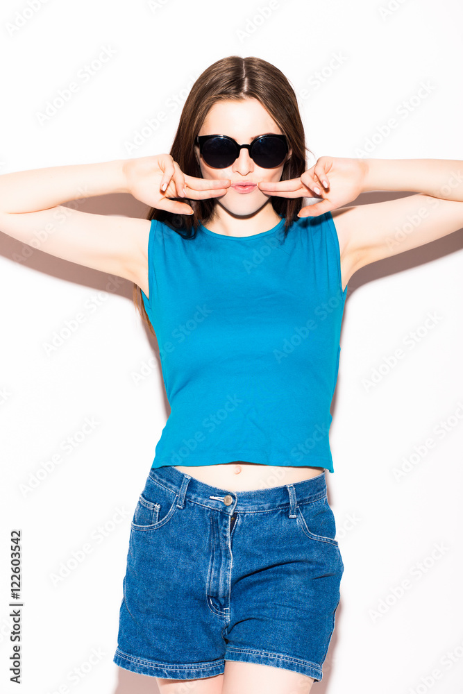 Studio photo of attractive woman isolated on white background. Studio photo of attractive woman isolated on white background.