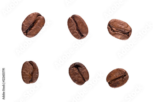 Brown coffee beans isolated on white background