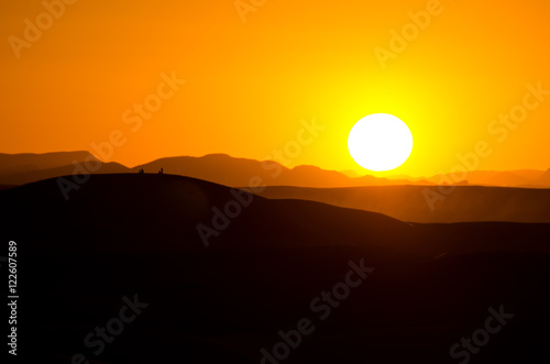 Sunset on Sahara desert