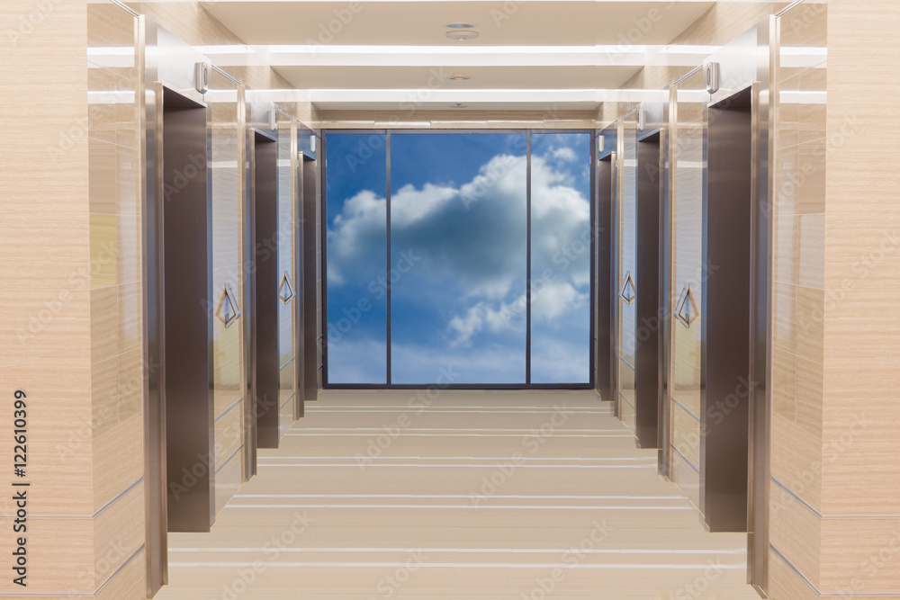 Elevator cabin stainless steel and  blue sky background