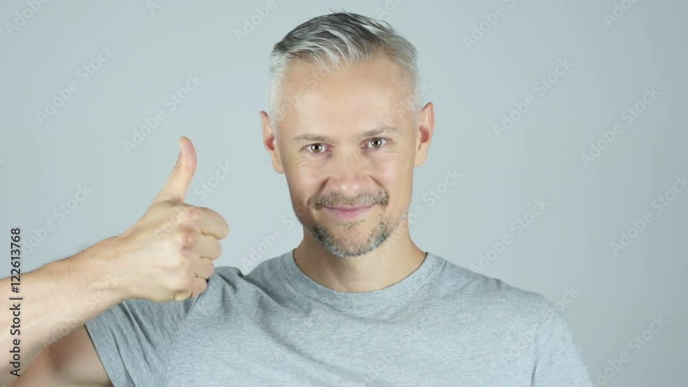 Thumbs Up By Handsome Middle age man Thumbs Up By Handsome Middle age man