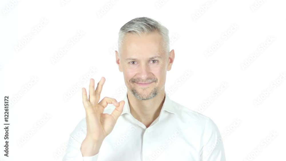 Ok Sign By Grey Haired Businessman , White Background