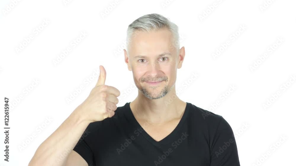 Thumbs Up by Confident Smiling Middle Aged Man, White Background Thumbs Up by Confident Smiling Middle Aged Man, White Background