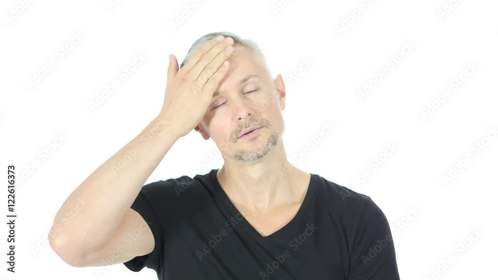 Frustrated, Upset Middle Aged Man with Headache, White Background Frustrated, Upset Middle Aged Man with Headache, White Background