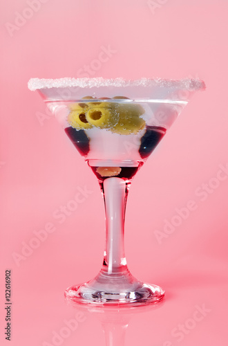 glass of martini with olives