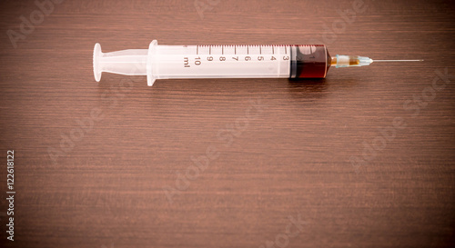 Drug syringe and cooked