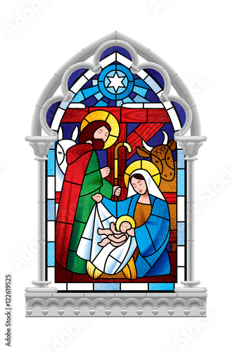 Stained glass window depicting Christmas scene in gothic frame