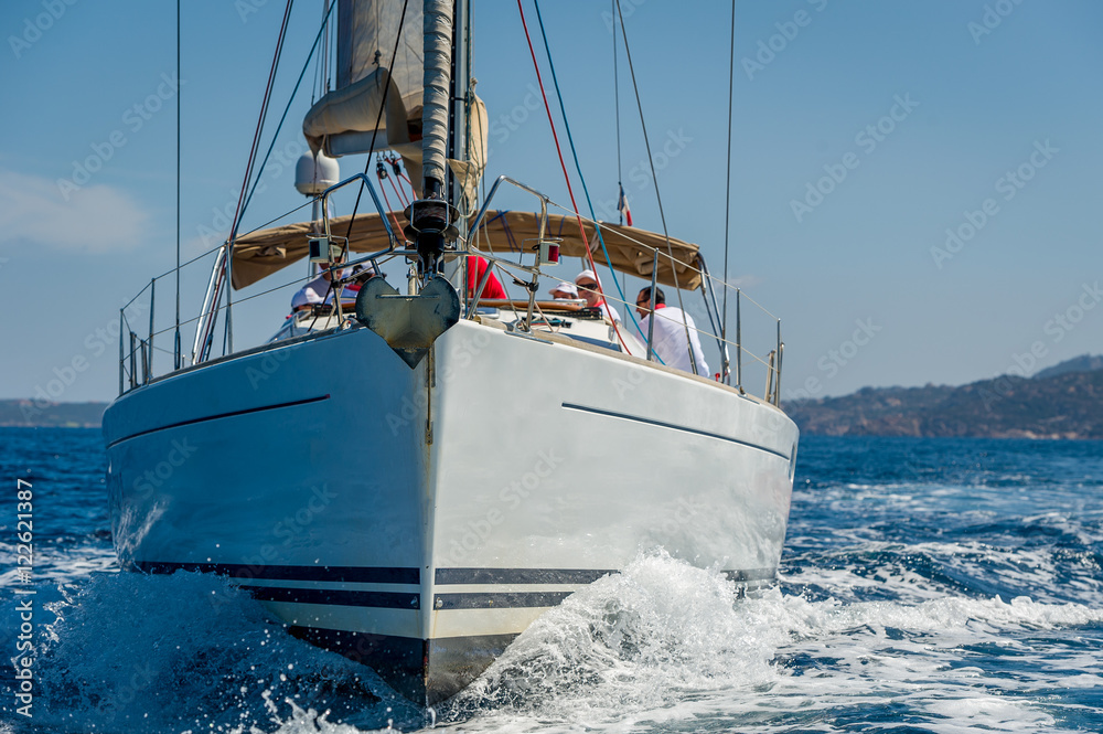 Fototapeta premium Sailing boat is going straight to the camera. Mediterranean sea cruising.