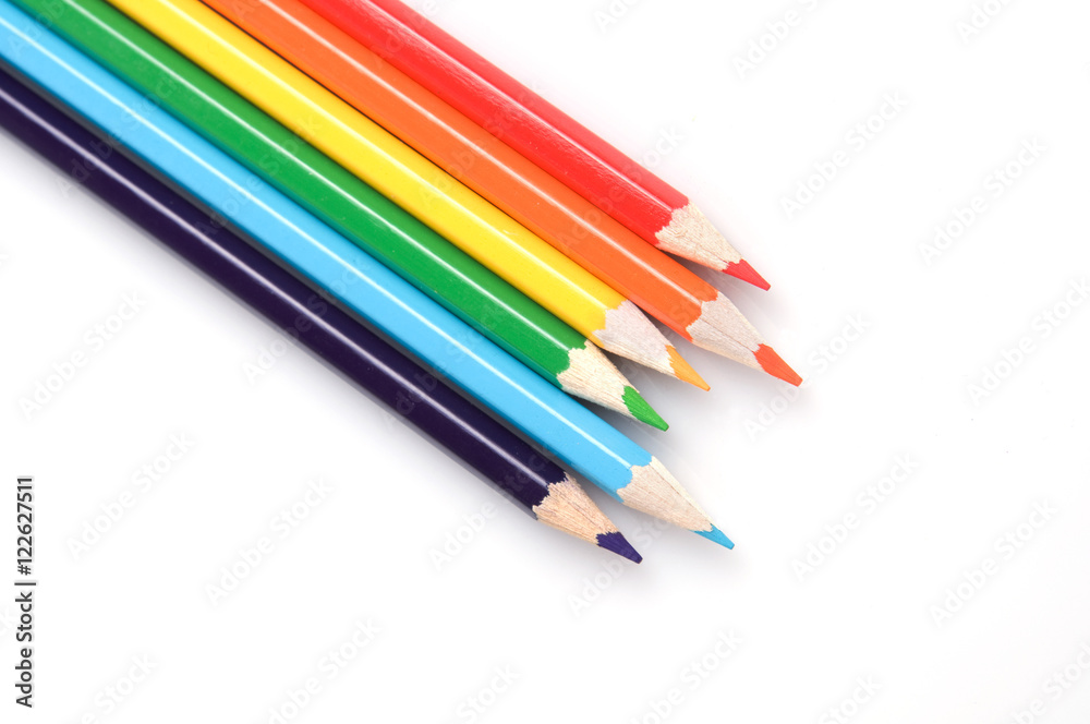 colorful pencils on a white background close-up colorful pencils on a white background close-up