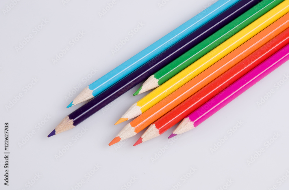 colorful pencils on a white background close-up