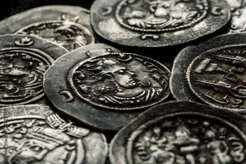 Ancient silver Sassanian coins closeup shot