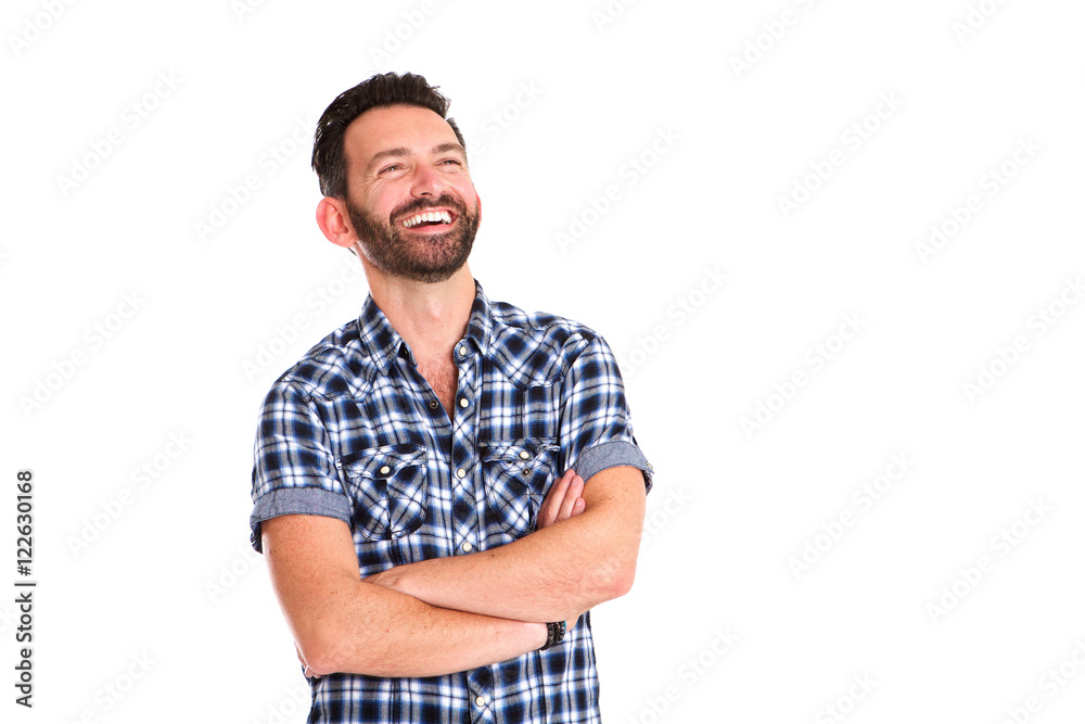 Handsome mature man standing with arms crossed and smiling Handsome mature man standing with arms crossed and smiling