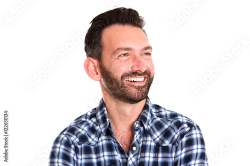 Happy mature man with beard looking away