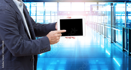 Businessman hand holding tablet computer