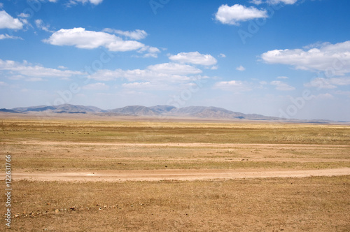 blue sky over the vast Mongolian steppes