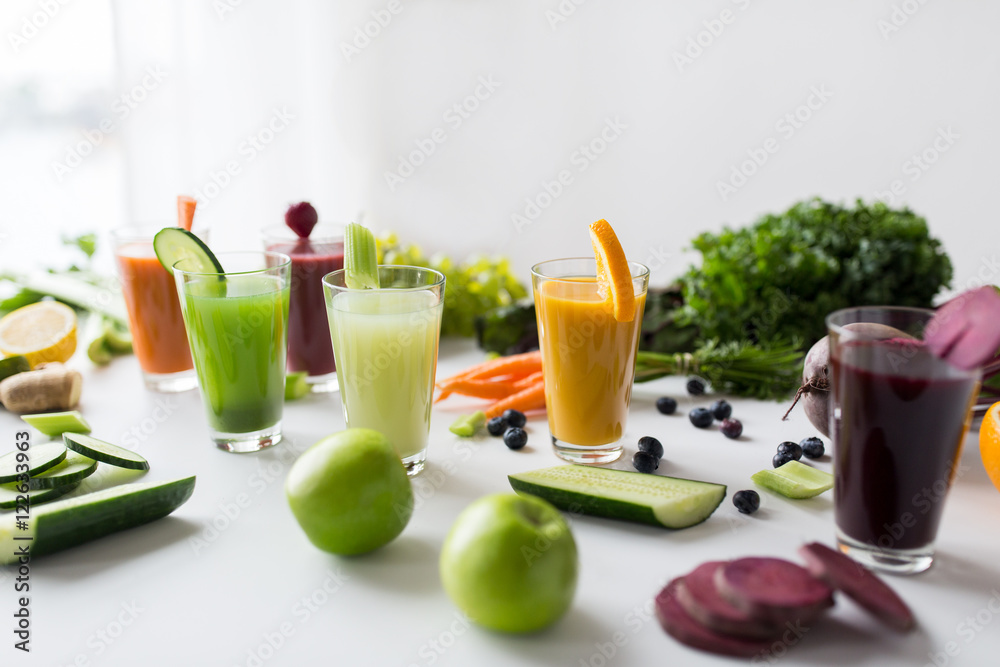 glasses with different fruit or vegetable juices glasses with different fruit or vegetable juices