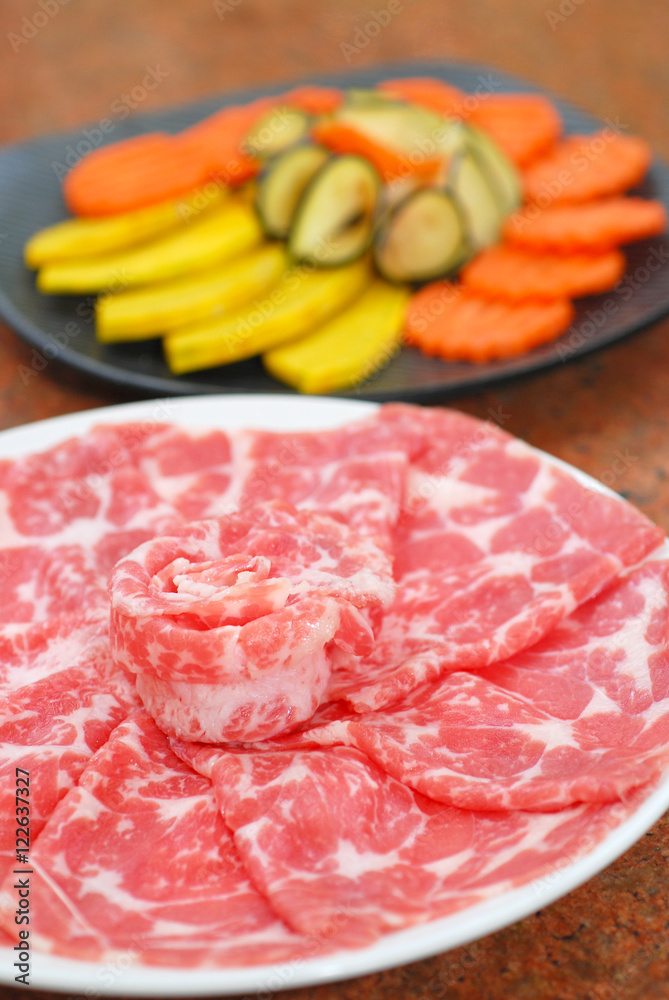 Premium raw japanese beef sliced on plate Premium raw japanese beef sliced on plate