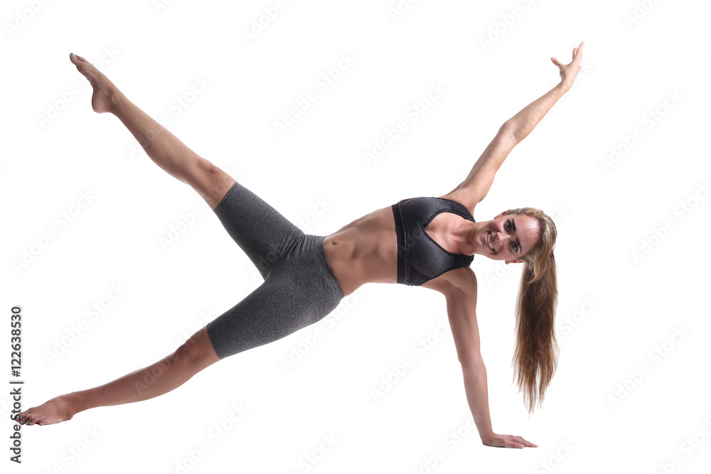 sporty girl doing backbend exercise.