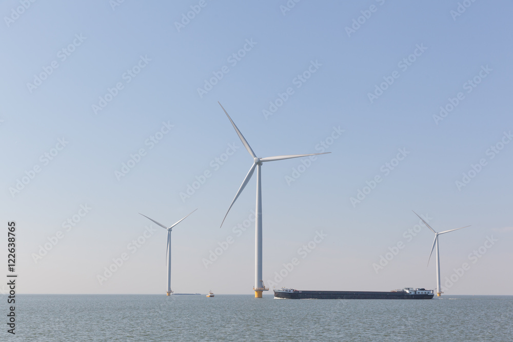 Windturbines  in the water producing alternative energy with a p