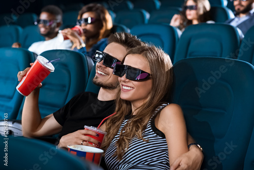 Photography Young happy couple having a date at the cinema
