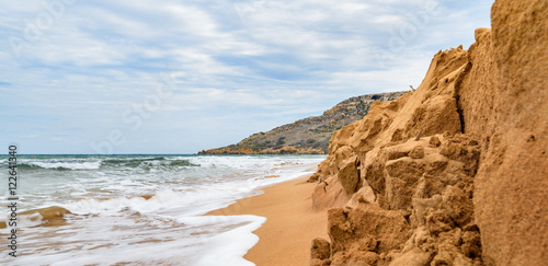 Malta, Ramla bay famous for its dark orange sandy beach, Gozo island. Seascape 