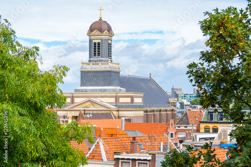 View of Hartebrugkerk church and houses from Burcht, citadel in old town of Leiden, Netherlands photo