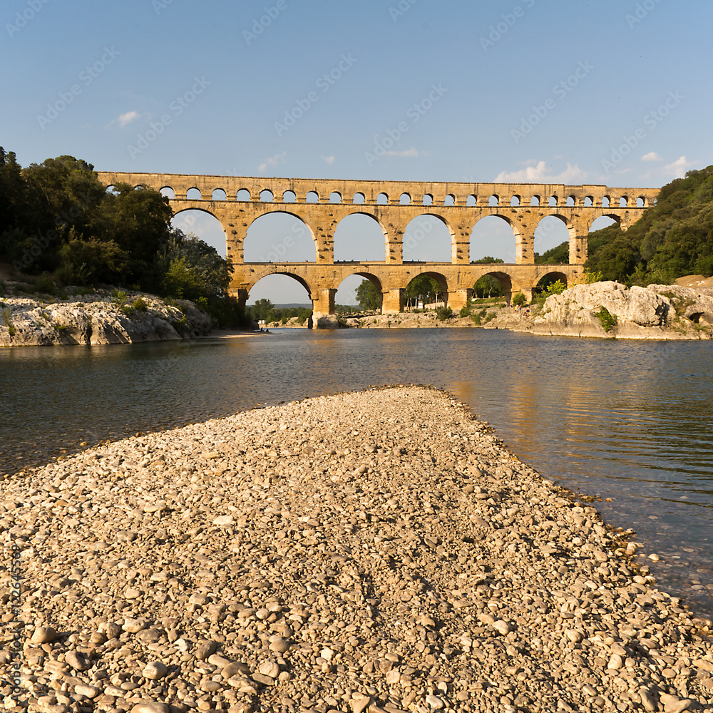 Fototapeta premium Roman aqueduct Pont du Gard, Unesco World Heritage site. Located near Nimes, Languedoc, France