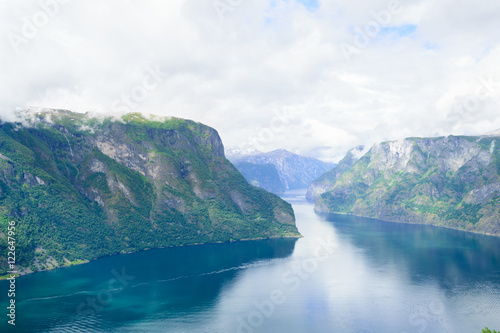 Fototapeta Naklejka Na Ścianę i Meble -  view of the winding steep rocky Norwegian fjord