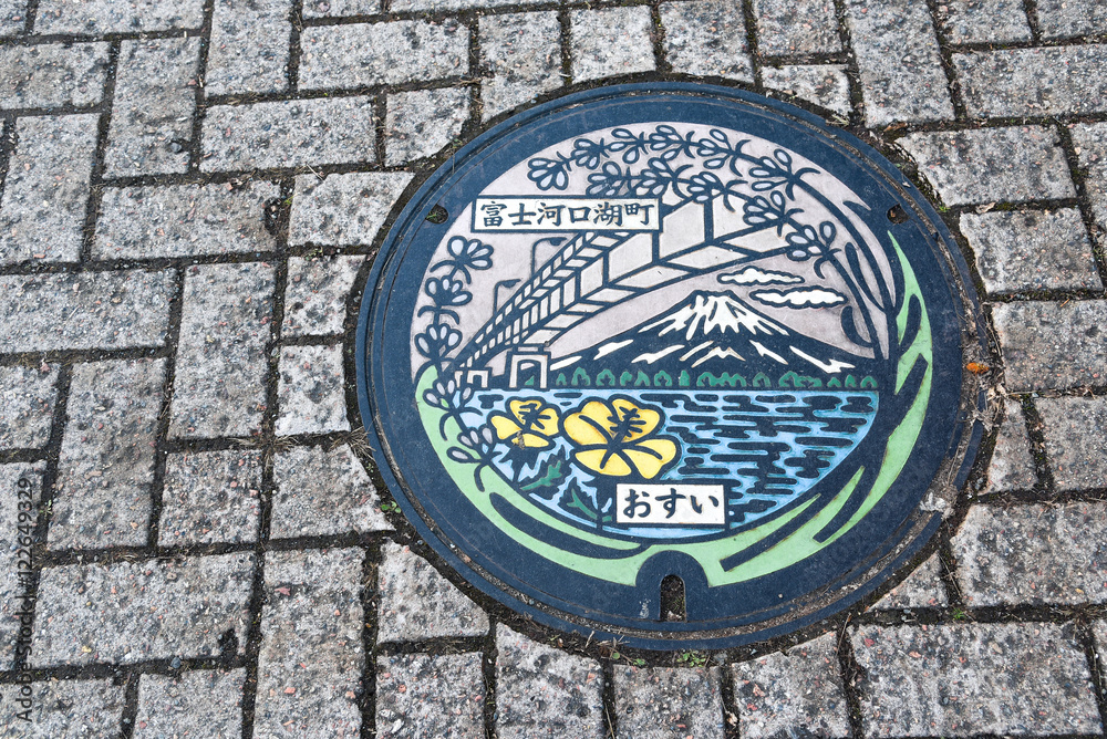 Metal sewer manhole at Kawaguchiko