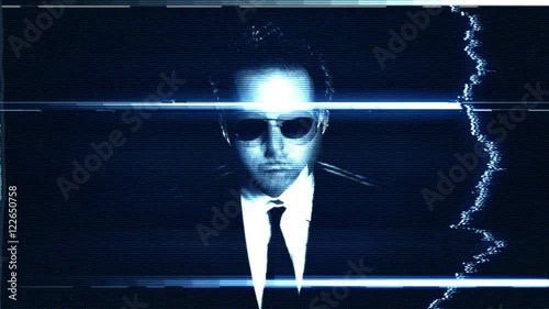 A 20 second loop of a Secret Agent man on closed circuit damaged TV screen.