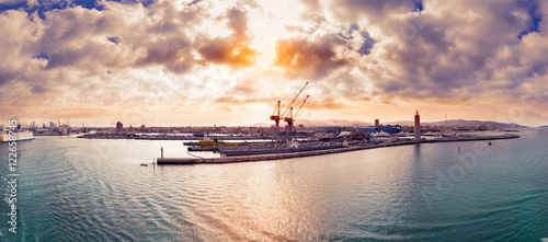 panoramic view of the livorno port on the mediterranean sea at s photo