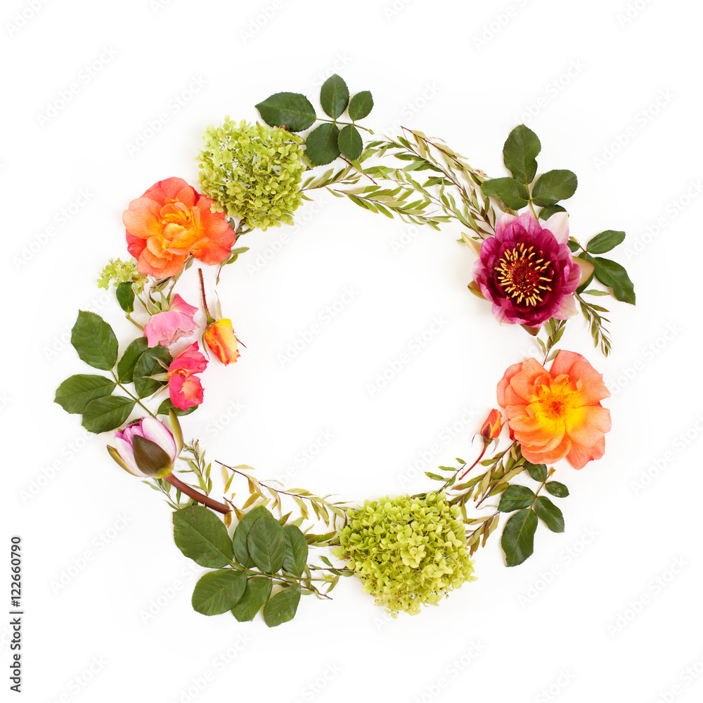 Floral round crown (wreath) with flowers and leaves. Flat lay