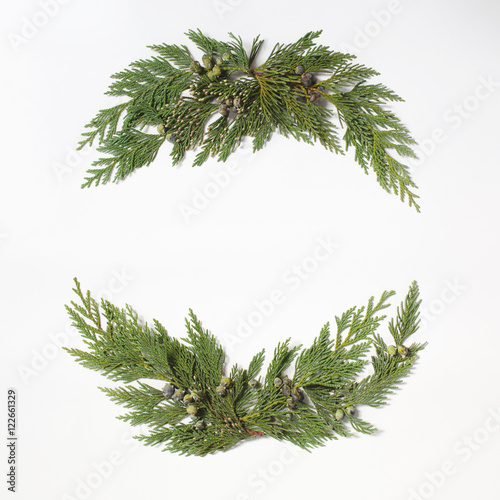 Christmas concept - frame wreath with evergreen Cupressus