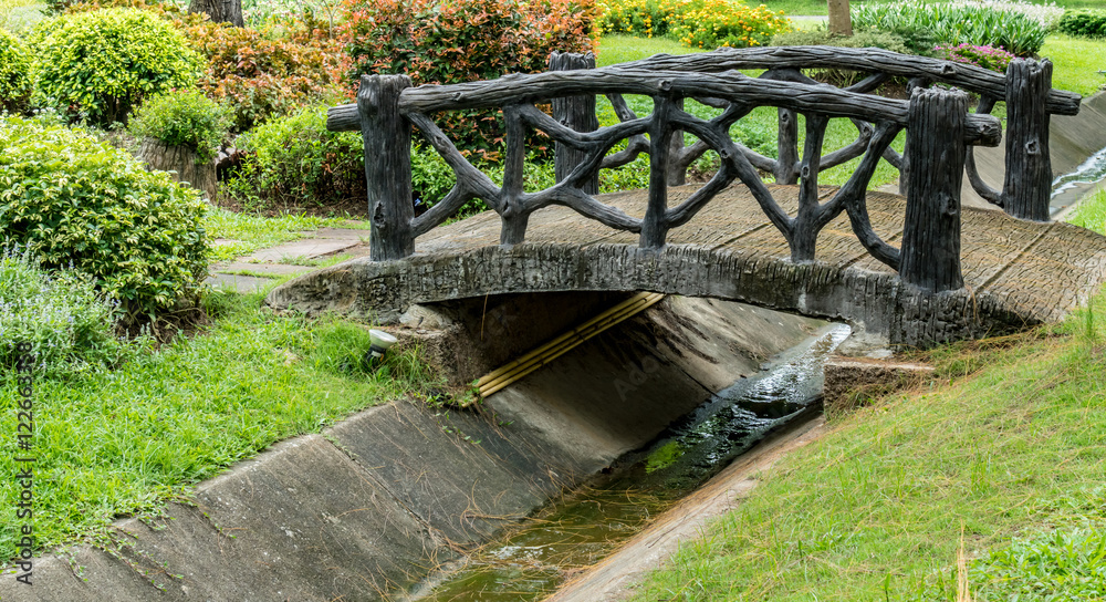 Fototapeta premium Small bridge in garden