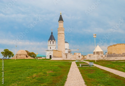 The mosque and the church. The combination of Christian and Muslim architecture photo