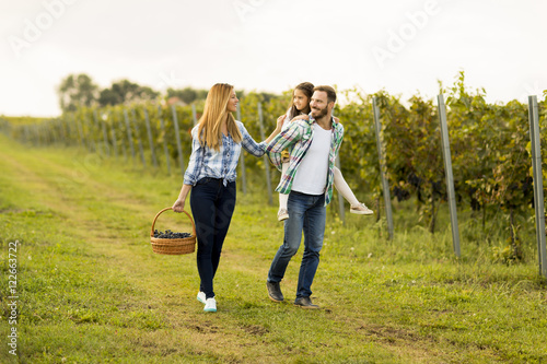 Happy family in vineyard