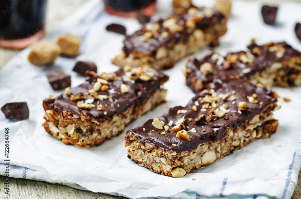 Coconut Granola Bars with chocolate glaze and nuts Coconut Granola Bars with chocolate glaze and nuts