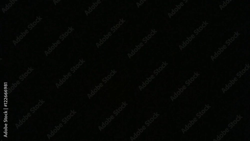 Soft and blurred multi colored lights isolated on black. HD 1080p.