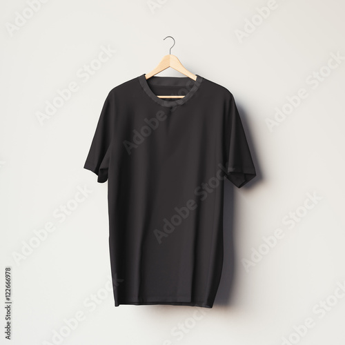 Black blank t-shirt on a wooden hanger. 3d rendering