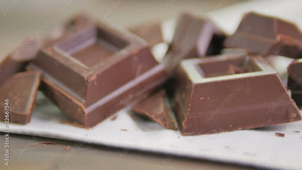 chocolate bar on wooden table dolly motion