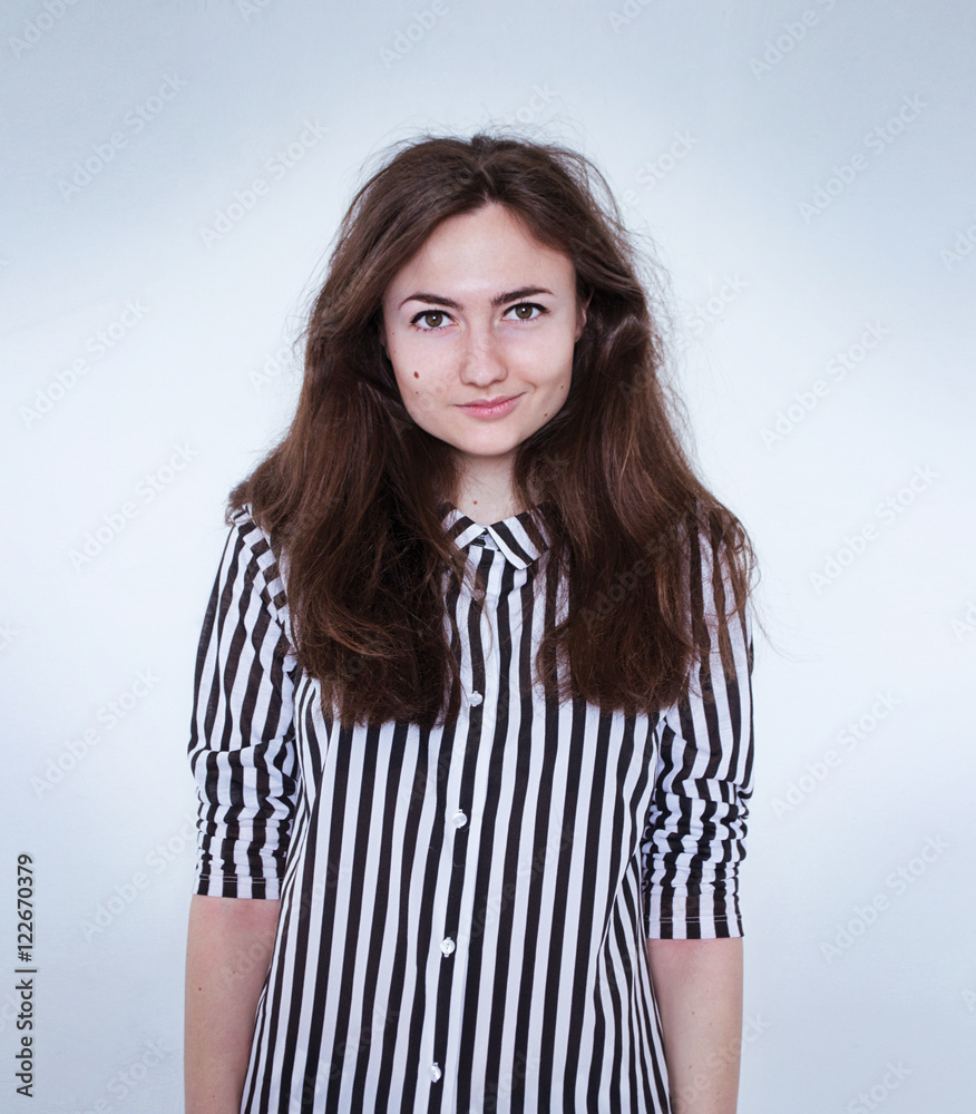 photo portrait of a girl in a striped shirt photo portrait of a girl in a striped shirt