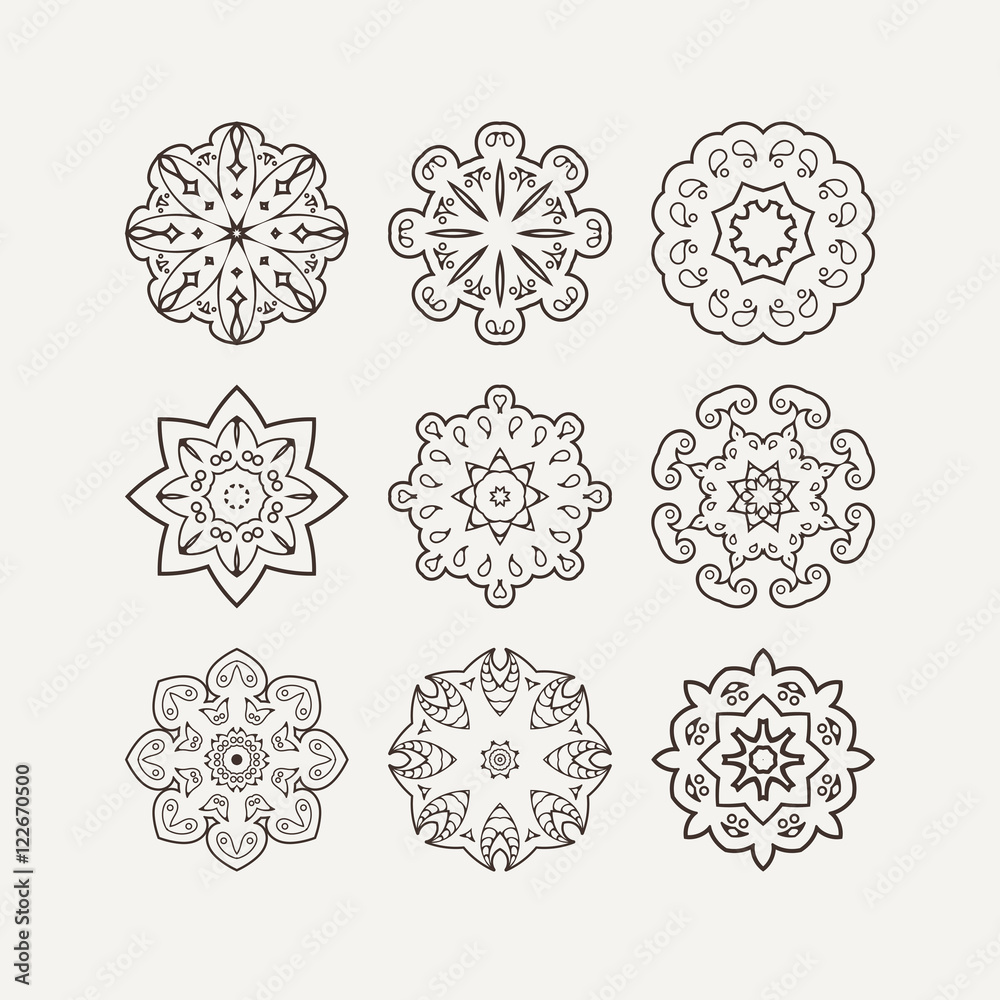 Set of ornate vector mandala symbols. Mehndi lace tattoo. Oriental weave. Set of ornate vector mandala symbols. Mehndi lace tattoo. Oriental weave.