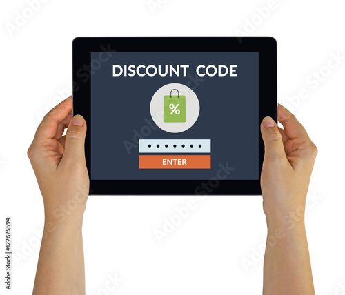 Hands holding tablet with discount code concept on screen. All screen content is designed by me