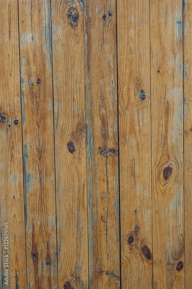 Naklejka premium Abstract background: yellow lacquered wood in the form of a flat board.